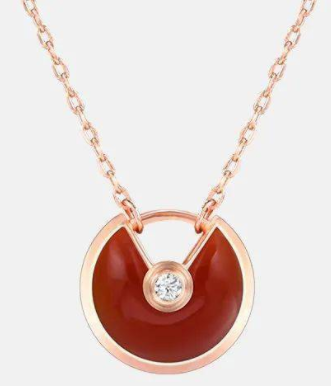 Collar medallón Cartier piedra roja oro rosa