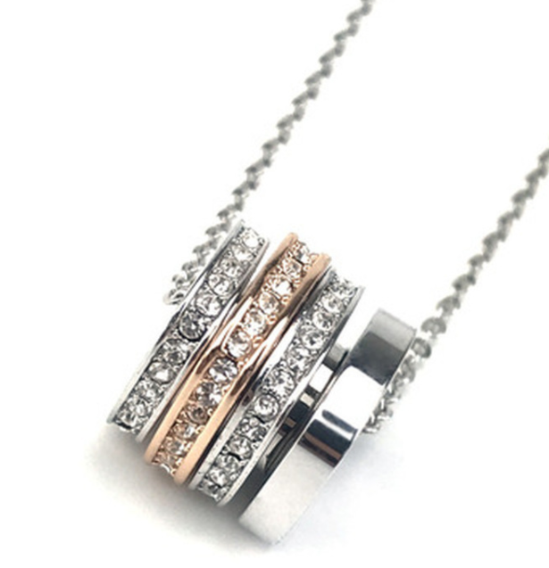 Collar Swarovski Cuatro Aros Giratorios Oro Blanco