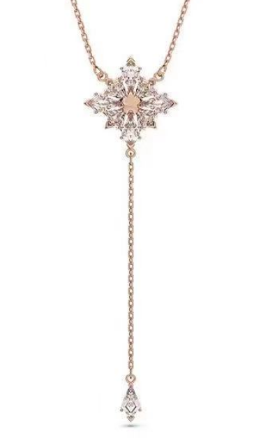 Collar Swarovski lazo estrella cristales blancos oro rosa