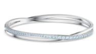 Brazalete Swarovski rígido cruzado cristales azul claro