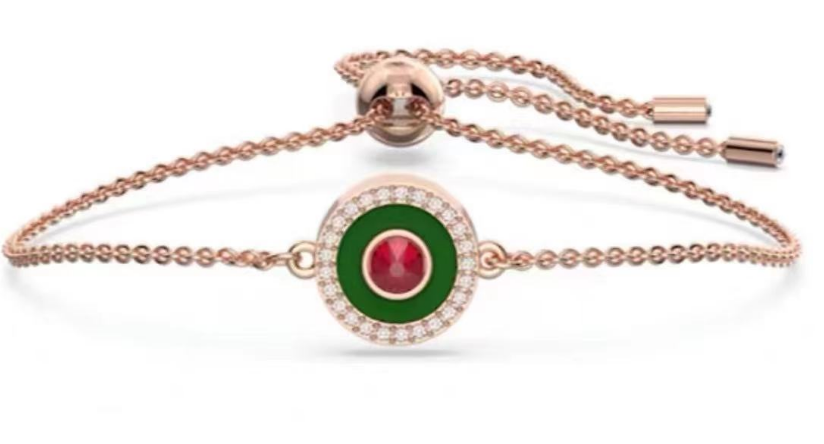 Brazalete Swarovski ojo protector verde y rojo tono oro rosa