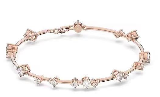 Brazalete Swarovski cristales dispersos tono oro rosa