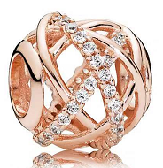 Charm bola calada líneas baño oro rosa Pandora