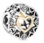 Charm corazones calados con detalle dorado Pandora