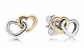 Aretes Pandora corazones entrelazados plata y baño dorado